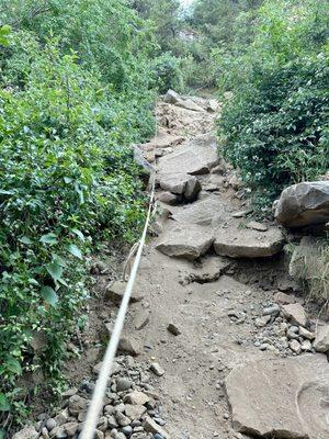 Use the rope for assistance while climbing to and from the base of Fall Creek Falls.