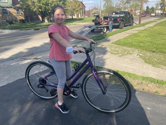 My daughter with her new bike.