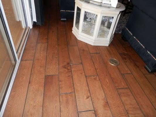 Warped hardwood flooring following a water loss.