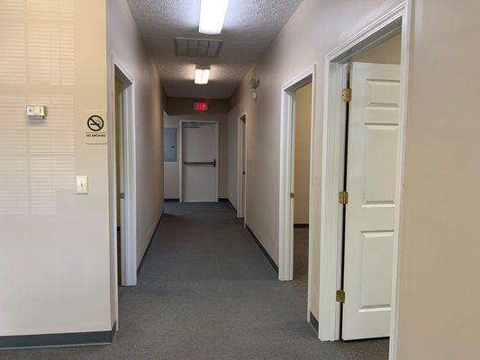 Hallway leads to 4 offices, extra large storage closet, and private bathroom.