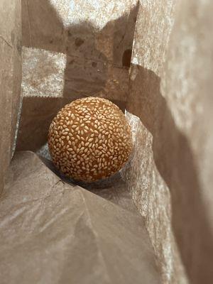 Coconut and white mung bean filled deep fried rice ball rolled in sesame seeds dessert‼