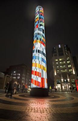 57 foot tower lit up at night.