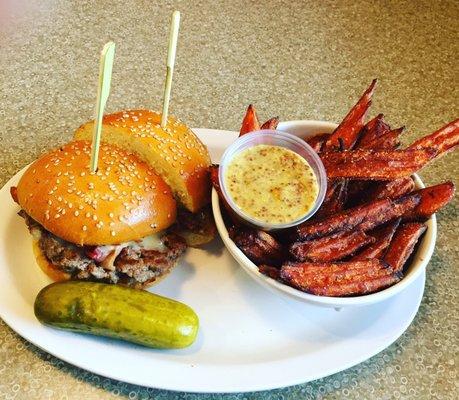 Maple Onion Bacon Burger with sweet potato fries and a pickle! To die for.