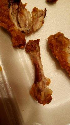 The dark red spots are raw spots but the chicken is gone, these are the wings I ate before realizing.