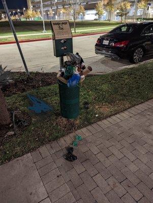 Dog waste containers are always overflowing.