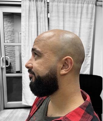 Head shave and beard maintenance! Tapered in the side burns. Took the mustache down and lined up.