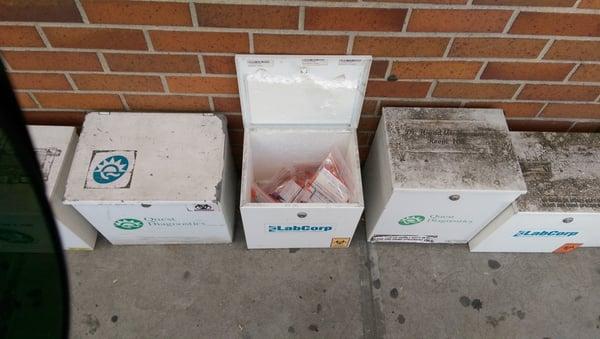 I found this box opened with blood and other human samples right outside the main entrance. How is that not a HIPA violation?