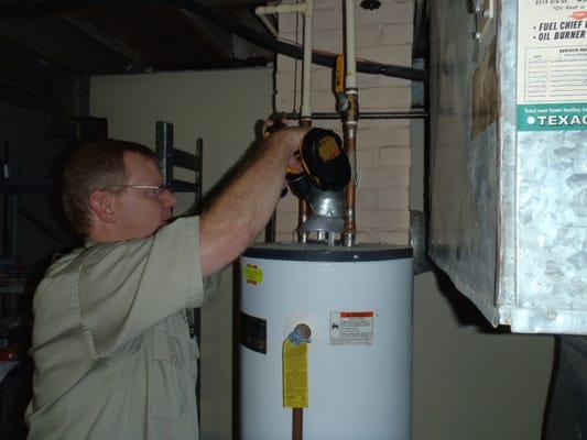 Testing a water heater for combustion safety and proper drafting