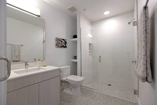 High end finishes throughout the bathroom with a stunning walk-in shower.