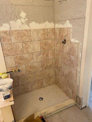 Small bathroom remodel and tile job, the mid journey pic.