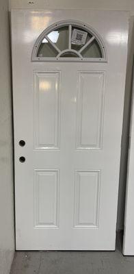 Steel entrance door with fanlite window