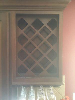 Before - unused built in wine rack in kitchen cabinets