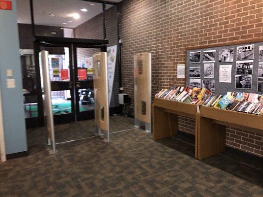 The books to the right under the black and white photos are for sell. Pick one & ask the front desk how much. It's negotiable.