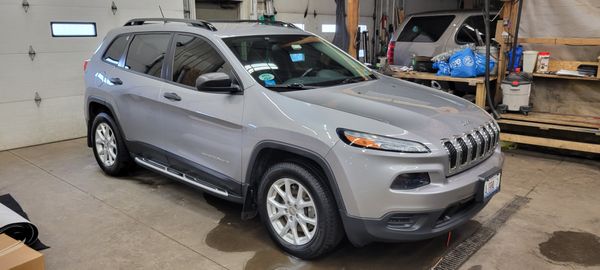 Nice shiny Jeep! Beautiful inside and out, they did the tint years ago, still looks great.