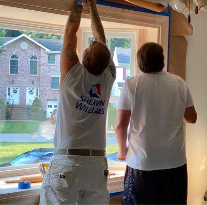 Joe and Mark prepare the area to be stained