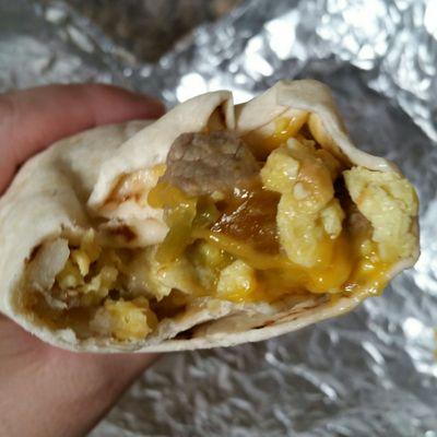 A look inside the steak, egg, green chile, cheese, and potato burrito. YUM!