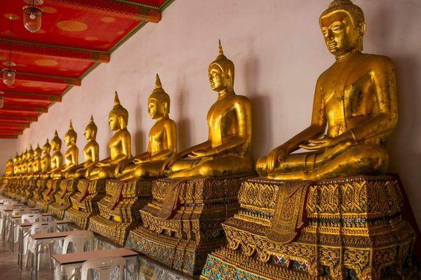 Endless Buddhas at Wat Pho in Bangkok, Thailand