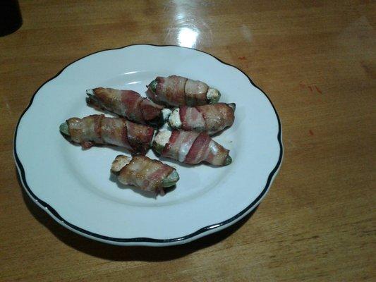 Bacon wrapped jalapenos. Stuffed with cream cheese.