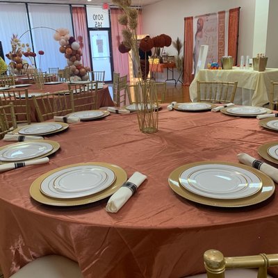 Warm Burnt Orange tones for a brunch of 60 guests.