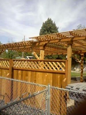 Cedar red wood mixed pergola.