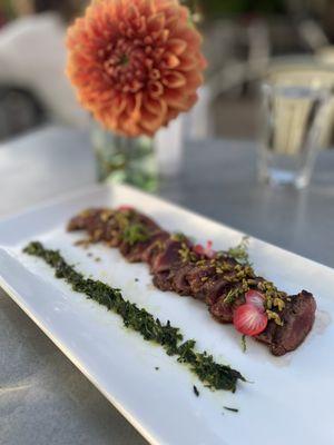 Lamb appetizer with a mint chimmichuri (I think it was called). Delicate and brightly flavorful.