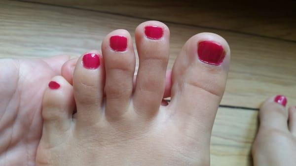 Shoddy work. Paint on my actual toes and cuticles not pushed back.