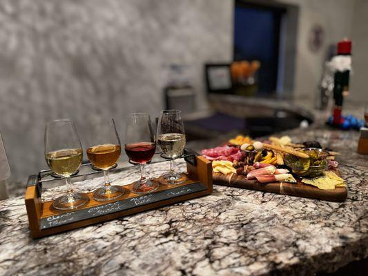 A wine flight and charcuterie board!