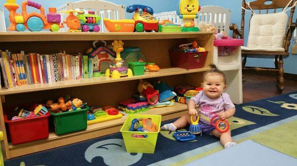 Plenty of manipulative are in easy reach in our cozy Infant Room.