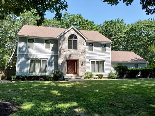 New roof and siding, we love this look with stone siding.