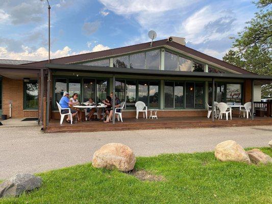 Outdoor eating area located at the Shot of the Day Bar and Grill