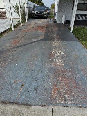 Pressure clean and paint driveway