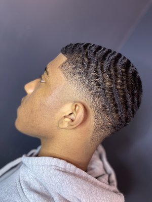 Tapered haircut with waves