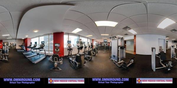 Fitness center in a large downtown commercial property panorama converted from a 360 virtual tour.