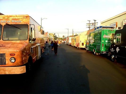 10-12 food trucks ready to serve.