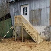 Old barn with a new metal roof and deck installed!