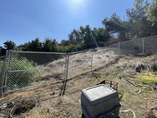 Fence , gate were part of this section installed.  Needed a gate to get equipment and machinery to rest of property.