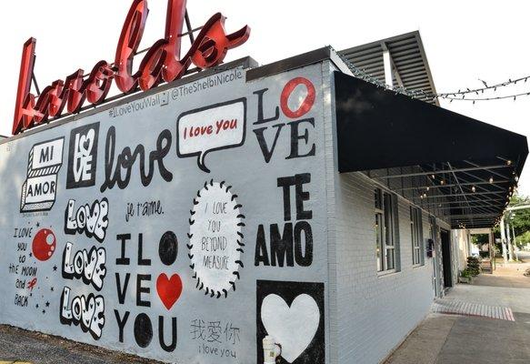 The iconic LOVE street art lines the side of Circa's new home.