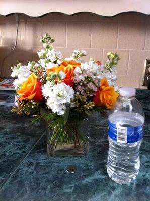 my $50 arrangement (there's a quarter and a water bottle for size)