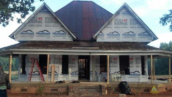 Before New Image Installed a new metal roof and siding.