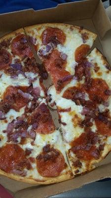 My free(!) birthday pizza. Alfredo sauce, pepperoni, bacon, and onion. It was amazing.