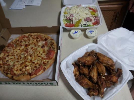 White pizza, 16 plain wings extra crispy and an antipasta. Delicious