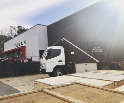 Dump truck outside Tesla