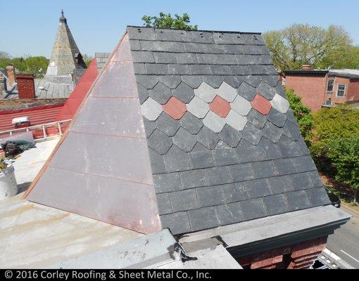 We installed the copper & slate roofs on this turret roof in Washington, DC.