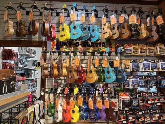 Ukulele selection (more on another wall)