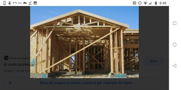 Frame car garage on single family house