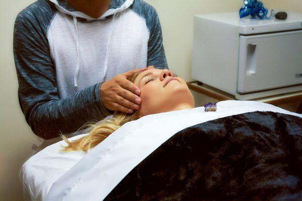 Dr. Jeffrey offering Reiki