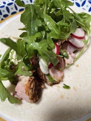 Pork loin & arugula tacos with the four-letter's signature jerk sauce! Yummy!!