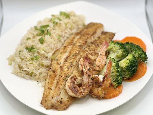 Grilled fish and shrimp with rice and veggies