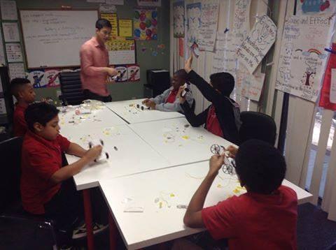 Our middle school scholars are enjoying their engineering class as they complete their study of circuits by building  electrical cars.