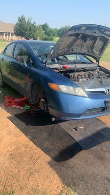 We are replacing the power steering pump on this Honda Civic at the customers home.